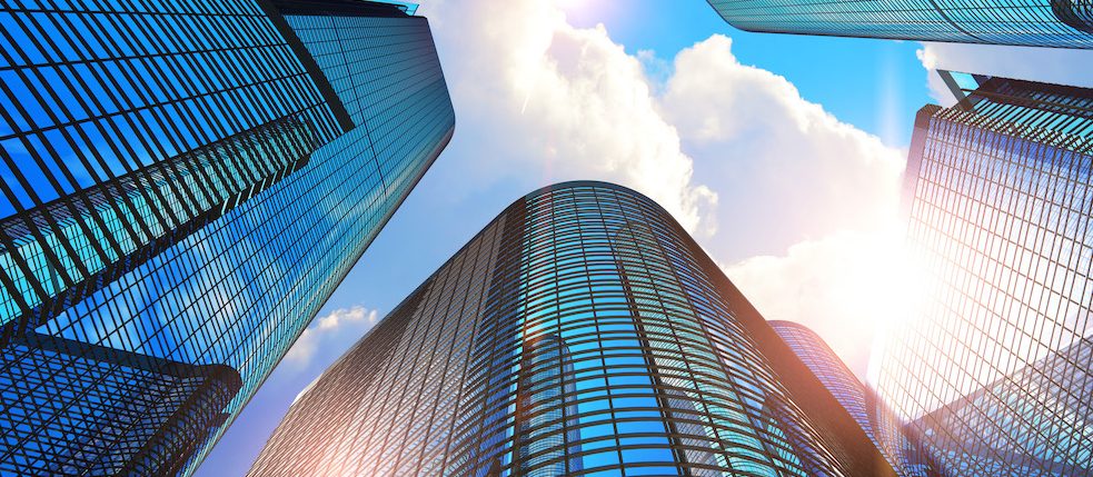 Looking up at skyscrapers
