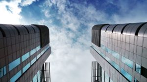 Looking up at skyscrapers
