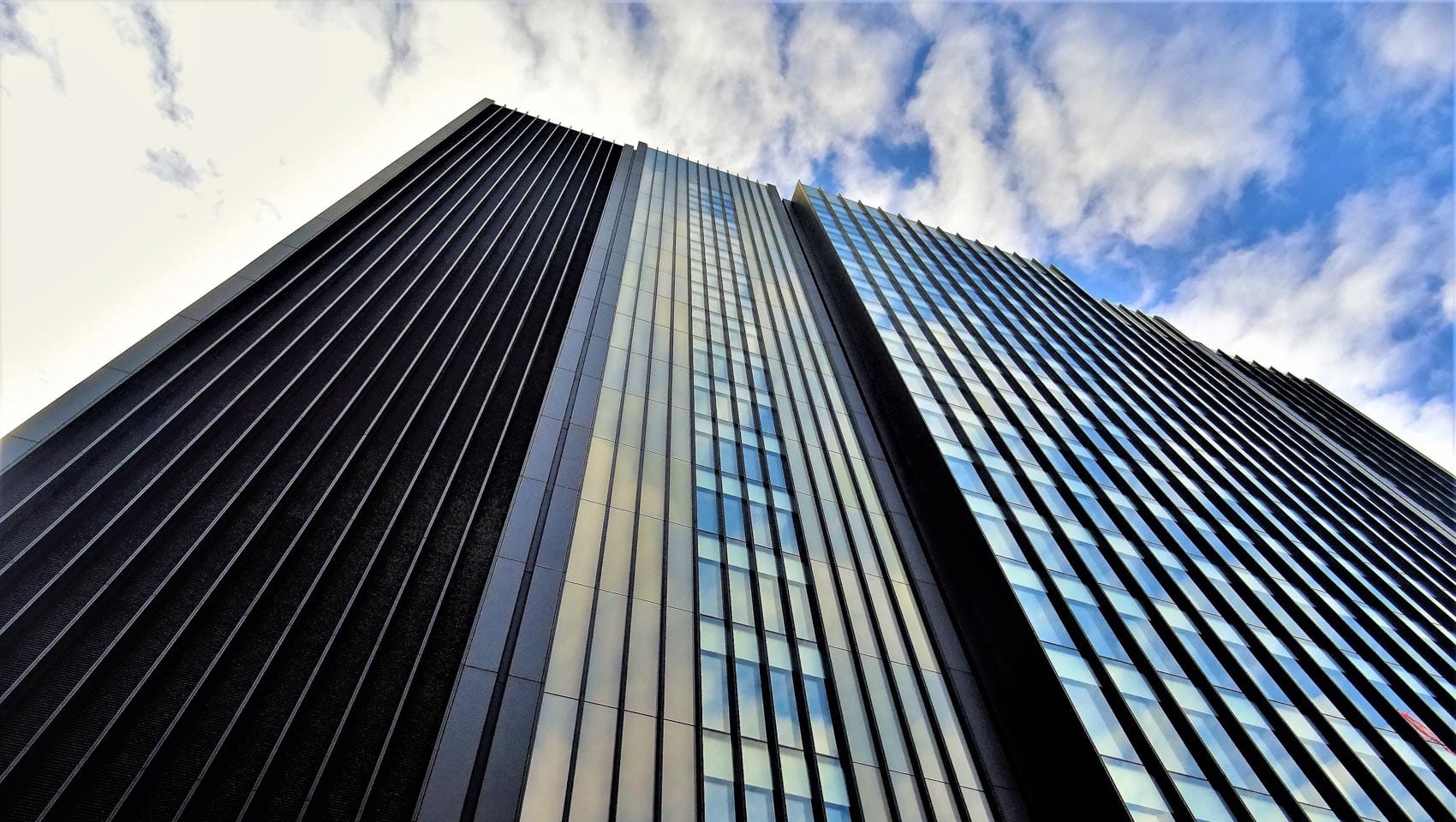 Looking up at city buildings