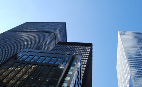 Looking up at skyscrapers