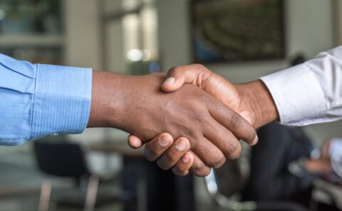Two men shaking hands