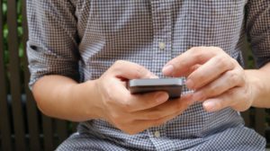 Adult using a smartphone
