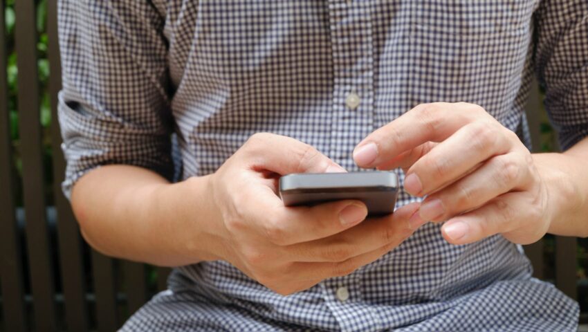 Adult using a smartphone