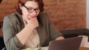 Woman sitting at computer