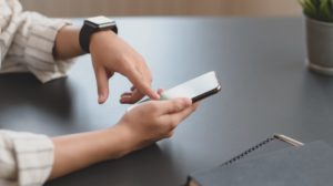 Adult using a smartphone