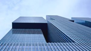 Looking up at tall building