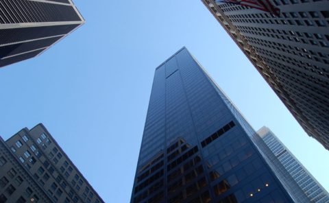 Looking up at skyscrapers