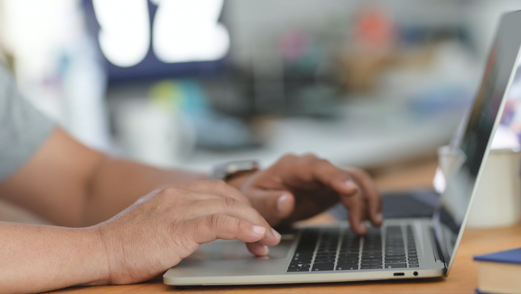 Person typing on a computer