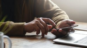 Adult using a smartphone