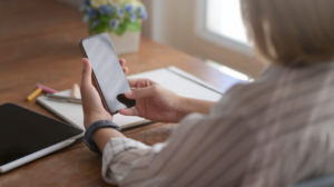 Adult using a smartphone
