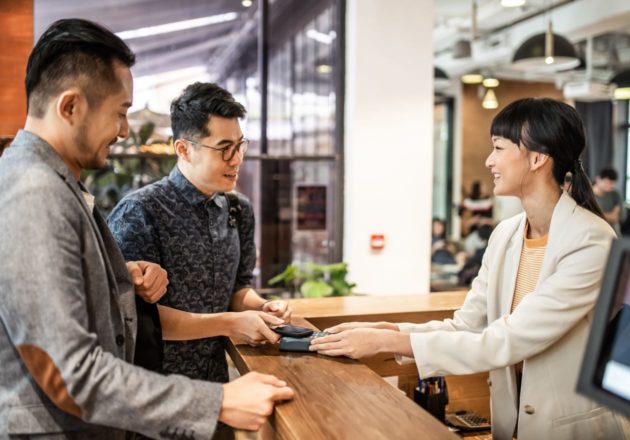Employees checking in with front desk security
