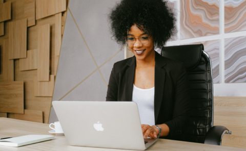 Woman sitting at computer