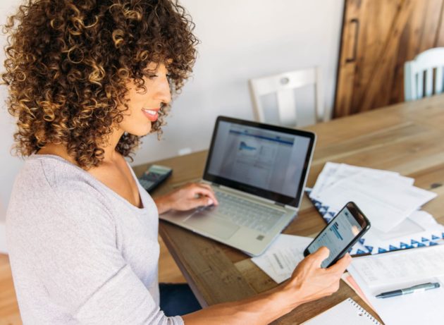 Woman migrating data to new Prism upgrade on her computer