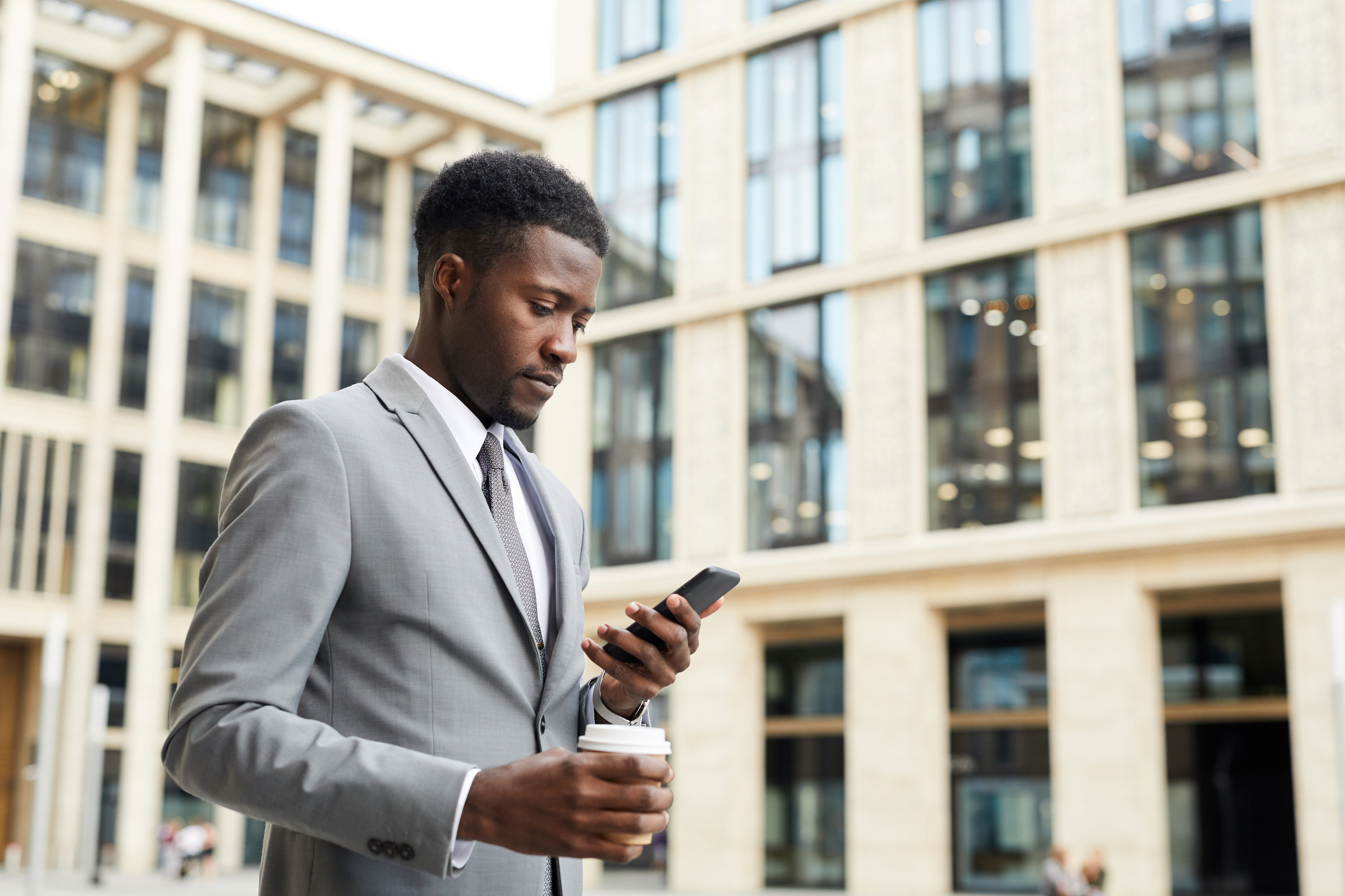 Male office tenant receiving an important protocol update send via internal communication tools.