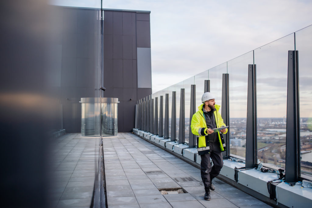 Engineer using building maintenance software