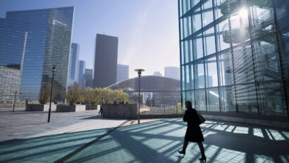 Businesswoman walking outside in city