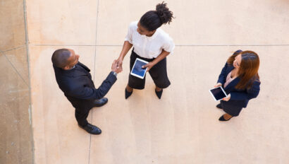 Business partners meeting in office hall